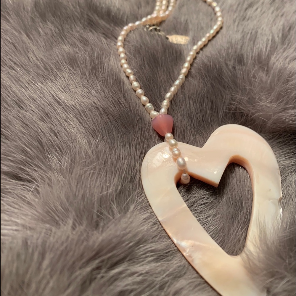 Fresh pink rice shaped pearls with shell heart